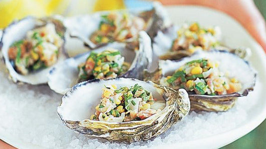 Pancetta & Lemon Oysters displayed on ice.