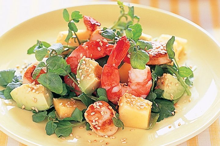 Avocado, Prawn And Scallop Salad served on a plate.