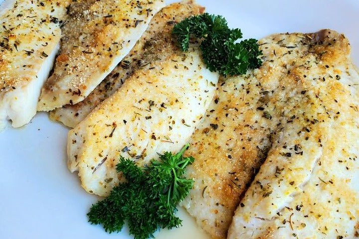 Baked Flounder on a plate.