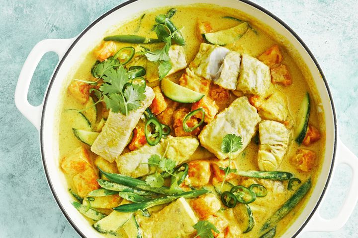 Barramundi Coconut Curry displayed in a pot.