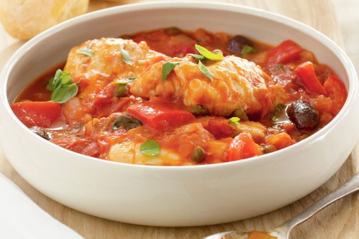 Braised Snapper served in white bowl.