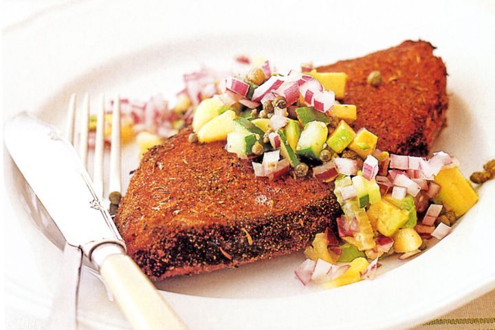 Cajun Crusted Blue Eye Cod displayed on white plate.