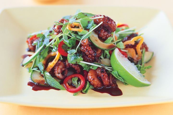 Chargrilled Octopus Salad in a white platter.