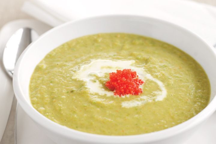 Chilled Asparagus Soup With Caviar served in a bowl.