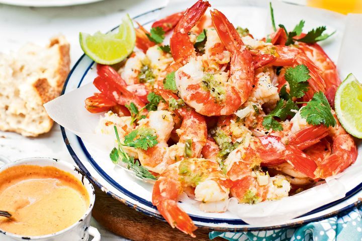 Chilli And Lime King Prawns With Chipotle Mayonnaise in a white dish.
