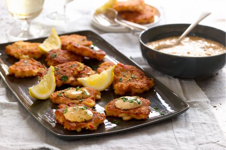 Crab Fritters With Remoulade Sauce on serving dish.