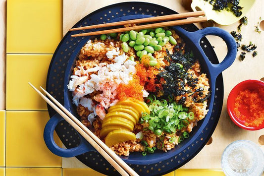 Crab Rice With Edamame And Tobiko on rustic plate.