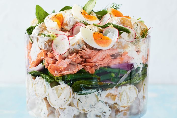 Creamy Salmon Potato Salad in clear bowl.