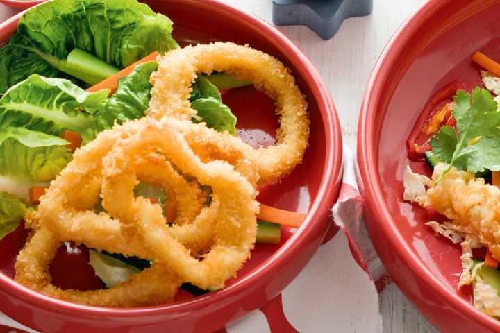 Crumbed Squid Rings displayed in red plates.