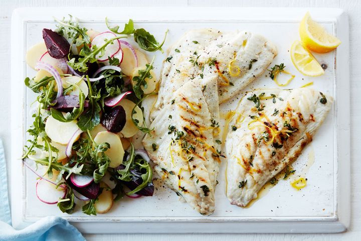 Garlic And Thyme Snapper With Summer Potato Salad on a white tray.