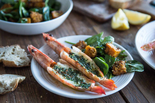 Grilled Paradise Prawns With Herb Marinade on a white plate.
