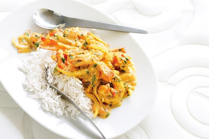 Indian Prawn Curry displayed on white plate.