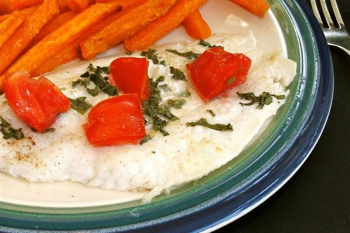 Italian Style Flounder displayed on a plate.