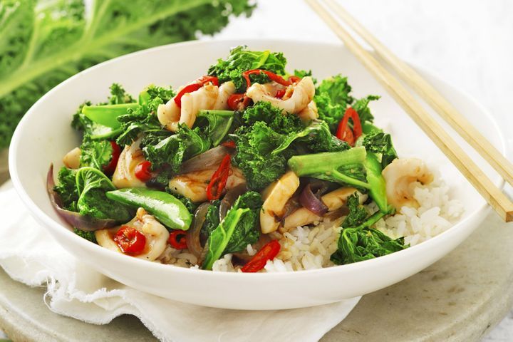 Kale, Chilli And Squid Stir Fry in a dish.
