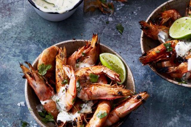 Keto Friendly Barbecued Banana Prawns With Herb Mayo displayed in bowls.