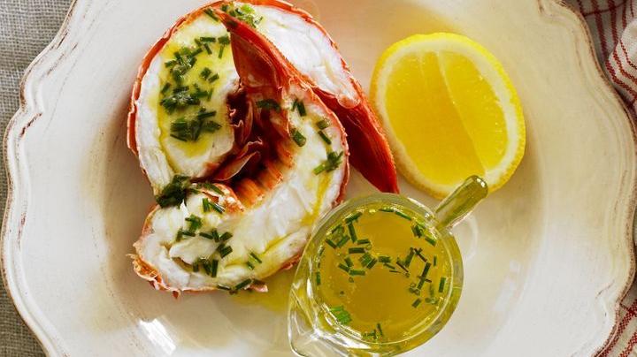 Luscious Lobster displayed on a white plate.
