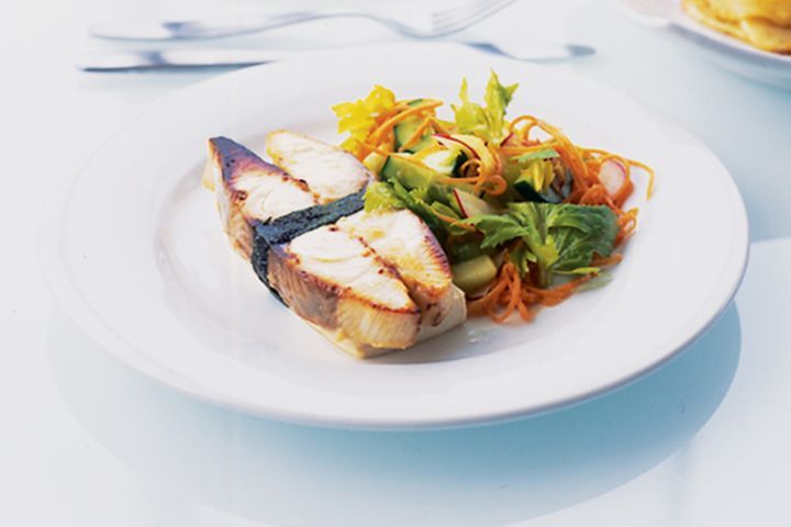 Miso Marinated Kingfish on white plate.