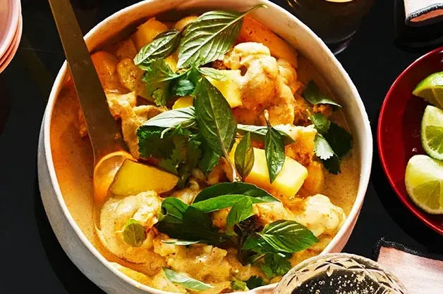 Moreton Bay Bug Curry With Mango in a bowl.