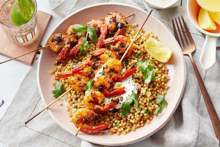 Moroccan Chermoula Prawns With Pearl Couscous displayed on a plate.