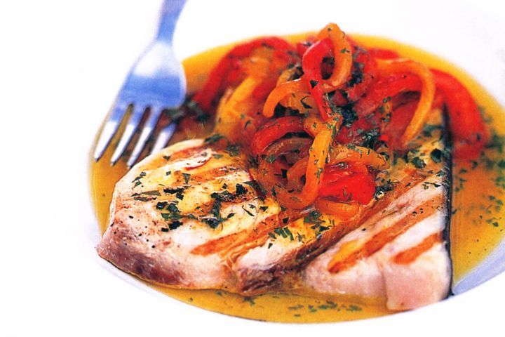 Moroccan Swordfish displayed on white plate.