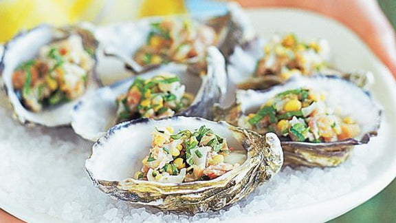 Pancetta & Lemon Oysters displayed on ice.