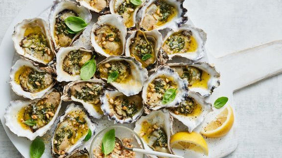 Perfect Pesto Oysters displayed on a plate.