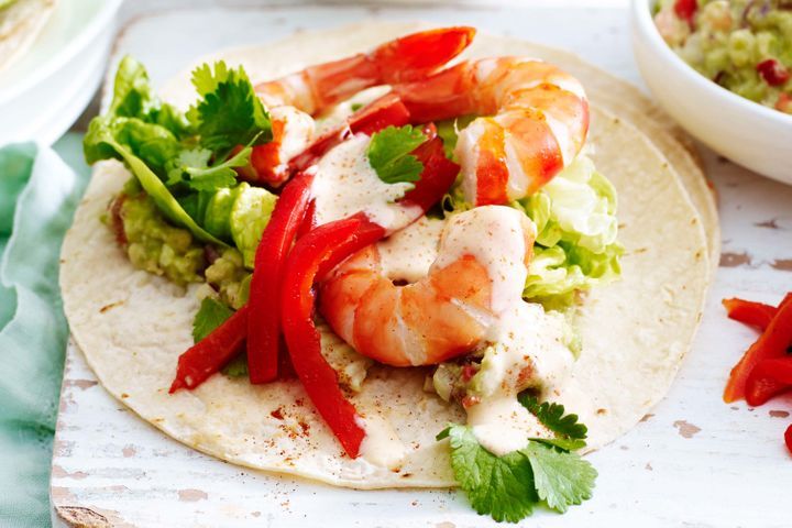 Prawn Soft Tacos displayed on table.