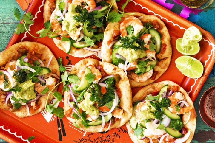 Prawn Tostadas on red platter.