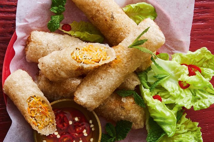 Prawn Vietnamese Fried Spring Rolls on display on red tray.
