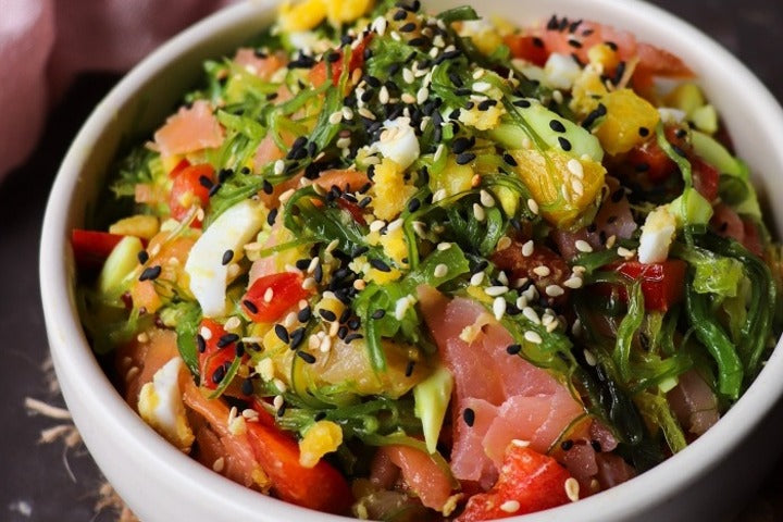 Seaweed Salad With Smoked Salmon in a bowl.