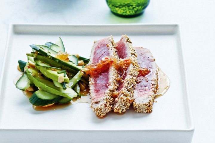 Sesame Crusted Tuna With Chilli And Ginger Dressing on serving tray.
