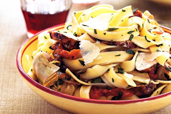 Sesame Prawn Cutlets With Honey Sauce presented in a yellow bowl.