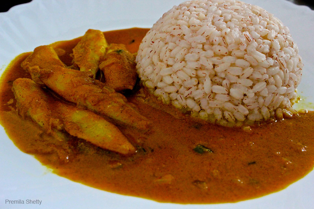 Silver Fish Curry on a white plate.