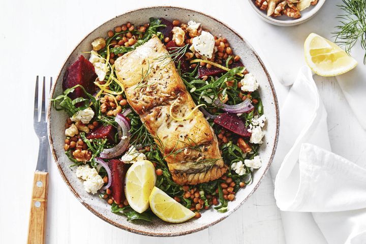 Silverbeet, Lentil And Fetta Salad With Barramundi in a bowl.