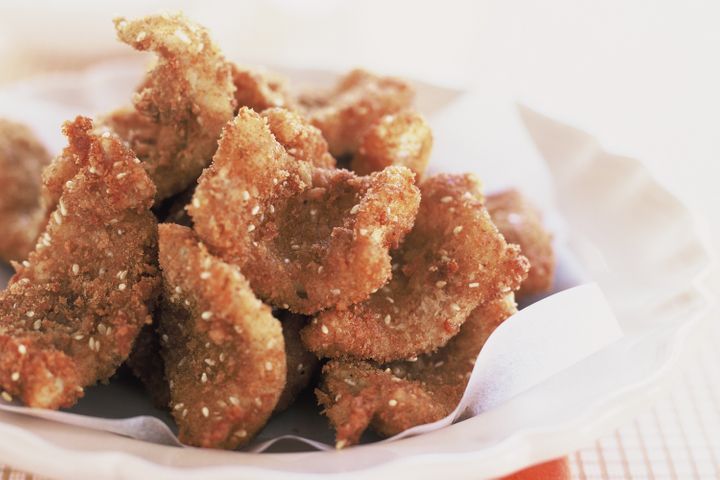 Spicy Crumbed Squid on a white plate.