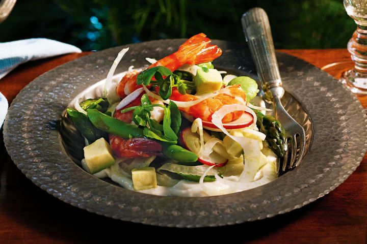 Tiger Prawn And Avocado Salad in a brown bowl.