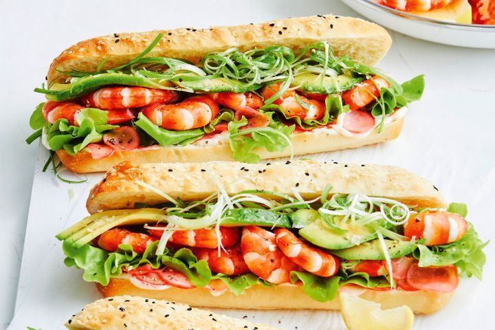 Tiger Prawn Rolls With Avocado And Pickled Radish presented on a platter.