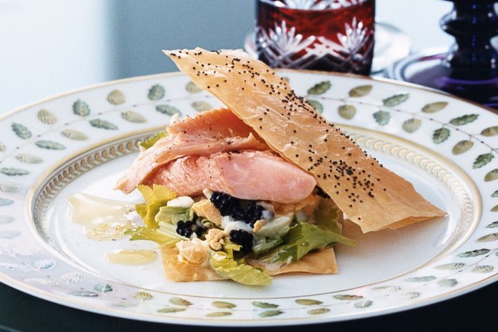 Trout With Egg, Celery And Caviar Sauce presented on plate.