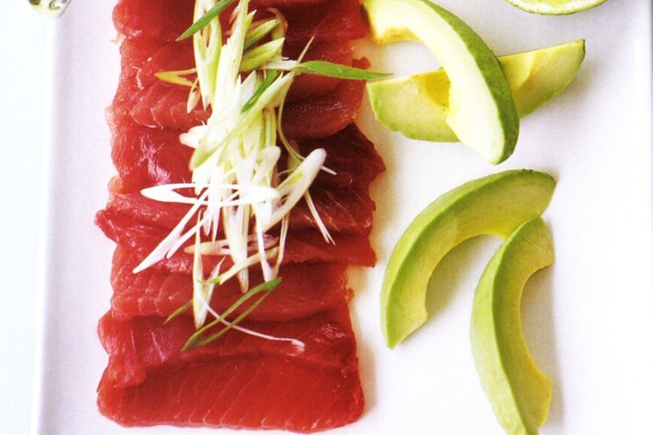 Tuna Sashimi on white platter.
