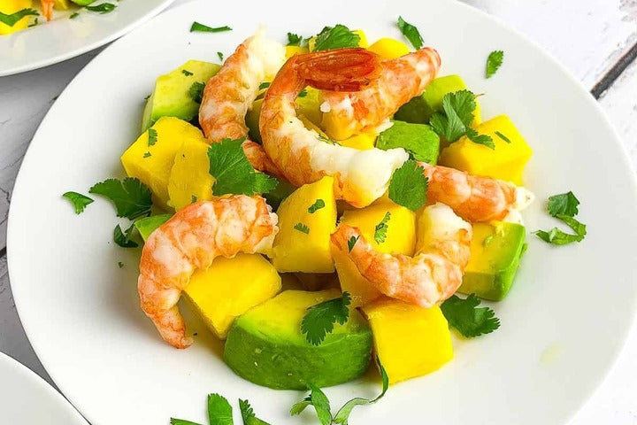 Vannamei Prawn And Mango Salad on a plate.