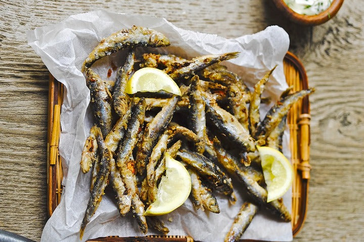 Whitebait And Dill Mayo on a baking tray.
